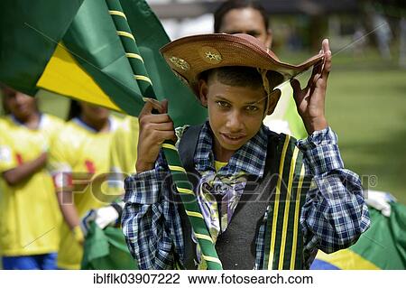 "Flag bearer of the Brazilian team wearing the traditional costume of the peasants of the Brazilian Northeast, opening ceremony of the Street Children World Cup 2014, Rio de Janeiro, Brazil, South America" View Large Photo Image Stock Image - "Flag bearer of the Brazilian team wearing the traditional costume of the peasants of the Brazilian Northeast, opening ceremony of the Street Children World Cup 2014, Rio de Janeiro, Brazil, South America". Fotosearch