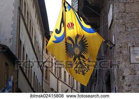 Flag of a contrada district in an alley of the historic town centre, Nobile Contrada dell'Aquila, Noble Contrada of the Eagle, Palio, UNESCO World Cultural Heritage Site, Siena, Tuscany region, province of Siena, Italy, Europe View Large Photo Image Stock Photo - Flag of a contrada district in an alley of the historic town centre, Nobile Contrada dell'Aquila, Noble Contrada of the Eagle, Palio, UNESCO World Cultural Heritage Site, Siena, Tuscany region, province of Siena, Italy, Europe. Fotosearch