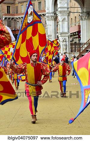 "Flag-waver the Contrada of the Snail, Contrada della Chiocciola, at the Palio di Siena, Piazza del Campo, Siena, Tuscany, Italy, Europe" View Large Photo Image Stock Photo - "Flag-waver the Contrada of the Snail, Contrada della Chiocciola, at the Palio di Siena, Piazza del Campo, Siena, Tuscany, Italy, Europe". Fotosearch