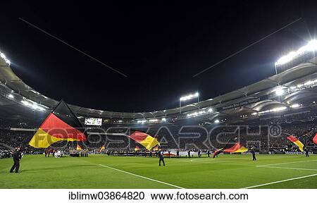 "Flag-wavers bearing German flags before the match Germany - Chile, Mercedes-Benz Arena, Stuttgart, Baden-Wurttemberg, Germany, Europe" View Large Photo Image Stock Image - "Flag-wavers bearing German flags before the match Germany - Chile, Mercedes-Benz Arena, Stuttgart, Baden-Wurttemberg, Germany, Europe". Fotosearch