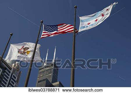 Stock Image - "Flags in front of Willis Tower, Chicago, Illinois, United States, North America". Fotosearch