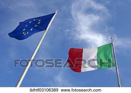 Flags of Europe and Italy flying in the wind View Large Photo Image Stock Photo - Flags of Europe and Italy flying in the wind. Fotosearch