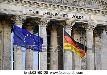 Stock Photo - "Flags of the European Union and Germany in front of the main gable of the Reichstag Building, Bundestag, Berlin, Germany, Europe". Fotosearch