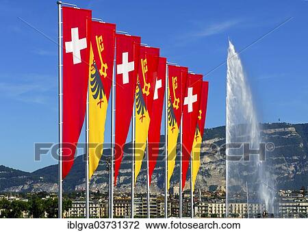 "Flags of the Swiss Confederation and the Canton of Geneva on the promenade of Lake Geneva with the Jet d'Eau fountain and the summit of Saleve Mountain at the rear, Geneva, Canton of Geneva, Switzerland, Europe" View Large Photo Image Stock Image - "Flags of the Swiss Confederation and the Canton of Geneva on the promenade of Lake Geneva with the Jet d'Eau fountain and the summit of Saleve Mountain at the rear, Geneva, Canton of Geneva, Switzerland, Europe". Fotosearch