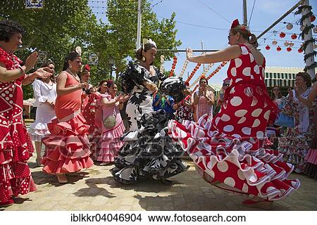 "Flamenco dancers at the Feria de Abril, Seville, Andalucia, Spain, Europe" View Large Photo Image Picture - "Flamenco dancers at the Feria de Abril, Seville, Andalucia, Spain, Europe". Fotosearch