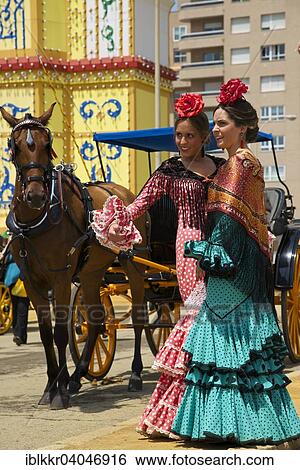 "Flamenco dancers at the Feria de Abril, Seville, Andalucia, Spain, Europe" View Large Photo Image Stock Photograph - "Flamenco dancers at the Feria de Abril, Seville, Andalucia, Spain, Europe". Fotosearch