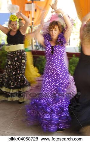 "Flamenco dancers at the Feria del Caballo, Jerez de la Frontera, Andalusia, Spain, Europe" View Large Photo Image Stock Photo - "Flamenco dancers at the Feria del Caballo, Jerez de la Frontera, Andalusia, Spain, Europe". Fotosearch