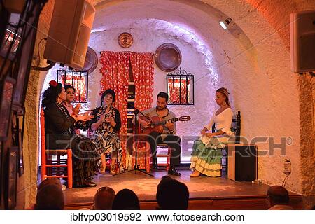"Flamenco performance on the stage of a former cave home, Los Tarantos flamenco club, Sacromonte, Granada, Granada province, Andalusia, Spain, Europe" View Large Photo Image Stock Image - "Flamenco performance on the stage of a former cave home, Los Tarantos flamenco club, Sacromonte, Granada, Granada province, Andalusia, Spain, Europe". Fotosearch