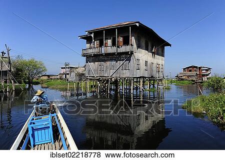 "Floating village on Lake Inle as seen from a boat, Burma also known as Myanmar, Southeast Asia, Asia" View Large Photo Image Stock Photo - "Floating village on Lake Inle as seen from a boat, Burma also known as Myanmar, Southeast Asia, Asia". Fotosearch