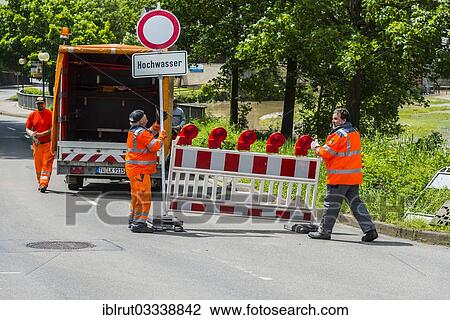 "Flood of the river Neckar, 02 Jun 2013 at noon, road patrol removing barrier because of flooding, Bad Niedernau, Rottenburg am Neckar, Baden-Wurttemberg, Germany, Europe" View Large Photo Image Stock Image - "Flood of the river Neckar, 02 Jun 2013 at noon, road patrol removing barrier because of flooding, Bad Niedernau, Rottenburg am Neckar, Baden-Wurttemberg, Germany, Europe". Fotosearch