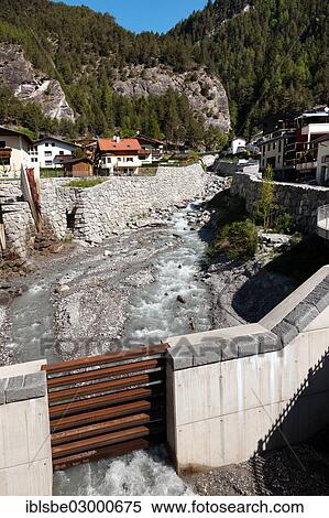 Stock Photography - "Flood protection, flood dam on the Stubnerbach stream, Pfunds, Oberinntal, Tyrol, Austria, Europe". Fotosearch