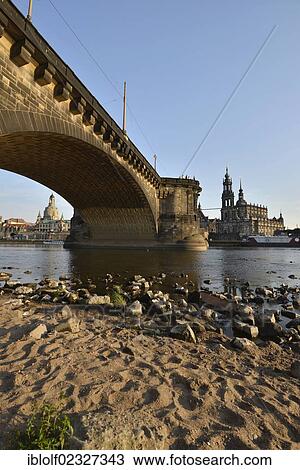 Stock Image - "Florence on the Elbe, Augustus Bridge over the Elbe river with Hofkirche, Cathedral of the Holy Trinity, largest church of Saxony, built 1739-1754, Albert Bridge and Frauenkirche, Church of Our Lady, Dresden, Saxony, Germany, Europe". Fotosearch