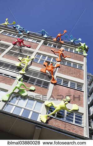 "Flossis figures on Roggendorf House, Media Harbour, Dusseldorf, North Rhine-Westphalia, Germany, Europe" View Large Photo Image Stock Photo - "Flossis figures on Roggendorf House, Media Harbour, Dusseldorf, North Rhine-Westphalia, Germany, Europe". Fotosearch
