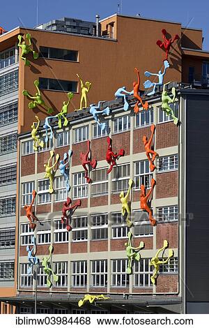 Stock Photo - "Flossis figures, Roggendorf-Haus, Media Harbour, Dusseldorf, North Rhine-Westphalia, Germany, Europe". Fotosearch