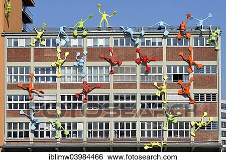 Stock Photograph - "Flossis figures, Roggendorf-Haus, Media Harbour, Dusseldorf, North Rhine-Westphalia, Germany, Europe". Fotosearch