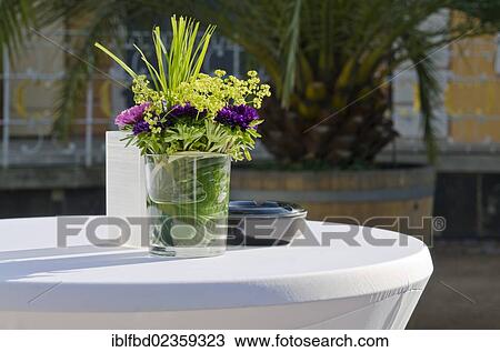 Stock Image - "Flower arrangement in a vase on a table, Dresden, Saxony, Germany, Europe". Fotosearch