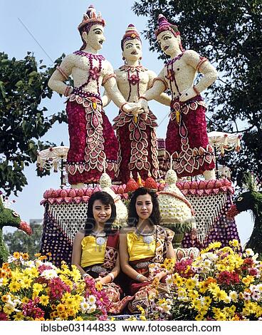 "Flower Festival, decorated float with two attractive women, statue of the three kings made from many flowers, Chiang Mai, Northern Thailand, Thailand, Asia" View Large Photo Image Stock Image - "Flower Festival, decorated float with two attractive women, statue of the three kings made from many flowers, Chiang Mai, Northern Thailand, Thailand, Asia". Fotosearch
