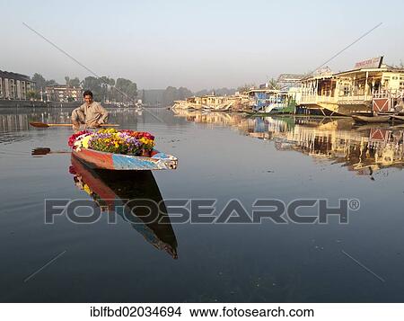 Picture - "Flowers are sold from shikaras on Dal Lake, Srinagar, Jammu and Kashmir, India, Asia". Fotosearch