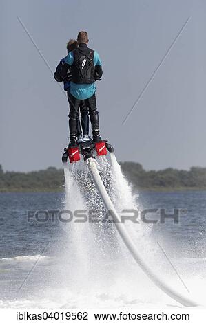 "Flyboard show, water jet of a jet ski, Walcheren, Zeeland province, The Netherlands, Europe" View Large Photo Image Stock Image - "Flyboard show, water jet of a jet ski, Walcheren, Zeeland province, The Netherlands, Europe". Fotosearch