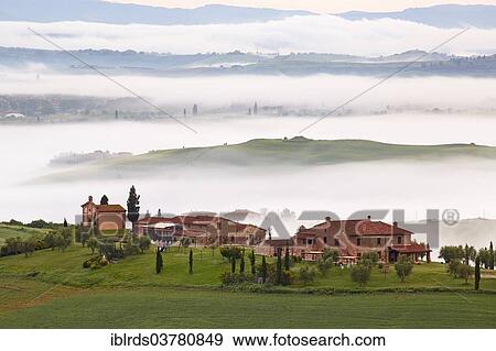 Stock Photo - "Fog in the valleys atPodere Baccoleno, Chiusure, Arbia, Tuscany, Italy, Europe". Fotosearch