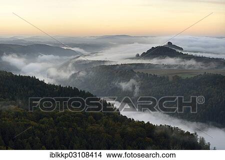 "Fog over the Elbe Valley, Zirkelstein Mountain and Kaiserkrone Mountain at dawn, Saxon Switzerland, Bad Schandau, Saxon Switzerland region, Saxony, Germany, Europe" View Large Photo Image Picture - "Fog over the Elbe Valley, Zirkelstein Mountain and Kaiserkrone Mountain at dawn, Saxon Switzerland, Bad Schandau, Saxon Switzerland region, Saxony, Germany, Europe". Fotosearch