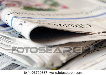 "Folded newspapers, Germany, Europe" View Large Photo Image Stock Photo - "Folded newspapers, Germany, Europe". Fotosearch