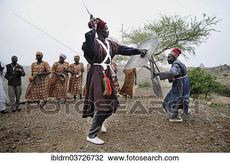 "Folklore group presenting traditional music and dance, Rhumsiki, Far North, Cameroon, Africa" View Large Photo Image Stock Image - "Folklore group presenting traditional music and dance, Rhumsiki, Far North, Cameroon, Africa". Fotosearch