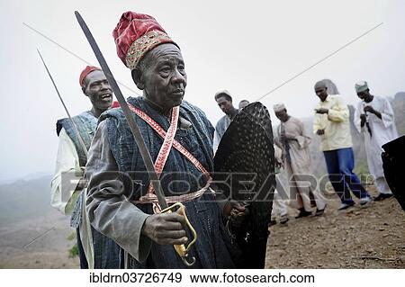 "Folklore group presenting traditional music and dance, Rhumsiki, Far North, Cameroon, Africa" View Large Photo Image Stock Photo - "Folklore group presenting traditional music and dance, Rhumsiki, Far North, Cameroon, Africa". Fotosearch