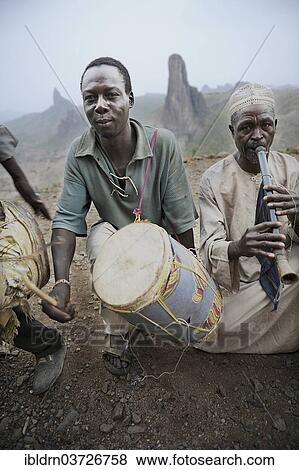 "Folklore group presenting traditional music and dance, Rhumsiki, Far North, Cameroon, Africa" View Large Photo Image Stock Photo - "Folklore group presenting traditional music and dance, Rhumsiki, Far North, Cameroon, Africa". Fotosearch
