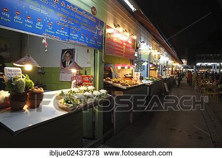 "Food stalls at the night market, Night Bazaar, Chiang Rai, Thailand, Asia" View Large Photo Image Stock Photo - "Food stalls at the night market, Night Bazaar, Chiang Rai, Thailand, Asia". Fotosearch