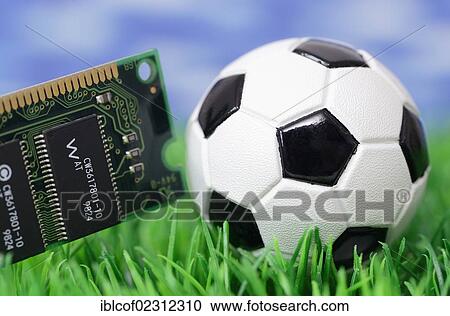 "Football and a computer chip, symbolic image for goal-line technology" View Large Photo Image Stock Image - "Football and a computer chip, symbolic image for goal-line technology". Fotosearch