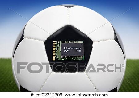 "Football with a computer chip, symbolic image for goal-line technology" View Large Photo Image Stock Photo - "Football with a computer chip, symbolic image for goal-line technology". Fotosearch