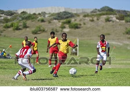 "Football youth teams playing at a tournament, Strandfontain, Cape Town, Western Cape, South Africa, Africa" View Large Photo Image Stock Photo - "Football youth teams playing at a tournament, Strandfontain, Cape Town, Western Cape, South Africa, Africa". Fotosearch