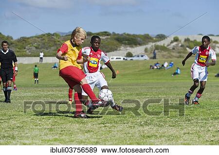 "Football youth teams playing at a tournament, Strandfontain, Cape Town, Western Cape, South Africa, Africa" View Large Photo Image Stock Photo - "Football youth teams playing at a tournament, Strandfontain, Cape Town, Western Cape, South Africa, Africa". Fotosearch