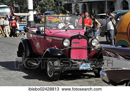 "Ford, built in 1928, convertible, classic car in the city center of Havana, Centro Habana, Cuba, Greater Antilles, Central America, America, North America" View Large Photo Image Stock Image - "Ford, built in 1928, convertible, classic car in the city center of Havana, Centro Habana, Cuba, Greater Antilles, Central America, America, North America". Fotosearch