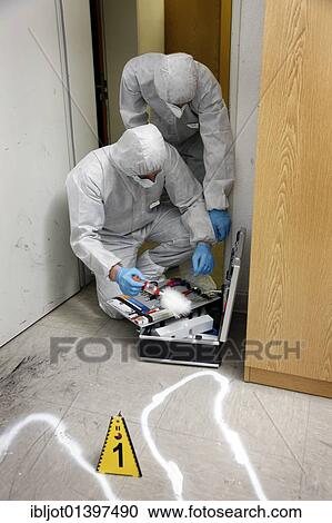 "Forensic's case, officers of the C. I. D., the Criminal Investigation Department, gathering forensic evidence at the scene of a crime, after a capital offence, homicide, re-enacted scene" View Large Photo Image Stock Image - "Forensic's case, officers of the C. I. D., the Criminal Investigation Department, gathering forensic evidence at the scene of a crime, after a capital offence, homicide, re-enacted scene". Fotosearch