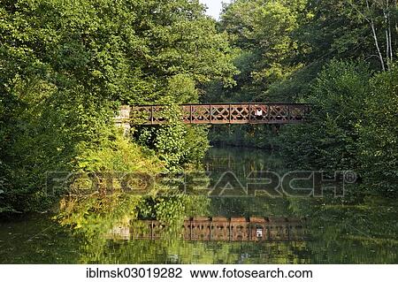 "Forest and an old steel bridge, Canal des Vosges, formerly Canal de l'Est, Selles, Vesoul, Region Franche-Comte, Dep. Haute-Saone, France, Europe" View Large Photo Image Stock Image - "Forest and an old steel bridge, Canal des Vosges, formerly Canal de l'Est, Selles, Vesoul, Region Franche-Comte, Dep. Haute-Saone, France, Europe". Fotosearch