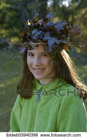 Stock Photo - "Forest fairy, girl wearing a crown made of foliage". Fotosearch