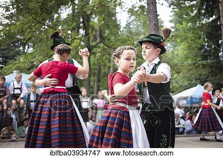 Stock Photo - "Forest festival of FC Real Kreuth at Leonhardstoana Hof, children of a traditional costume and Plattler group performing, Kreuth, Upper Bavaria, Bavaria, Germany, Europe". Fotosearch
