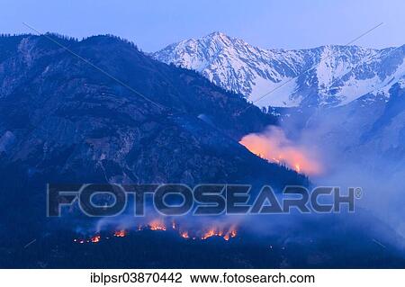Stock Image - "Forest fire on Mt Hochmahdkopf, Tyrol, Austria, Europe". Fotosearch