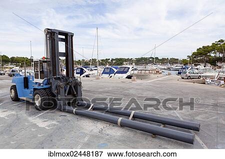 "Forklift for lifting yachts, harbour of Porto Petro, Mallorca, Majorca, Balearic Islands, Spain, Europe" View Large Photo Image Stock Photo - "Forklift for lifting yachts, harbour of Porto Petro, Mallorca, Majorca, Balearic Islands, Spain, Europe". Fotosearch