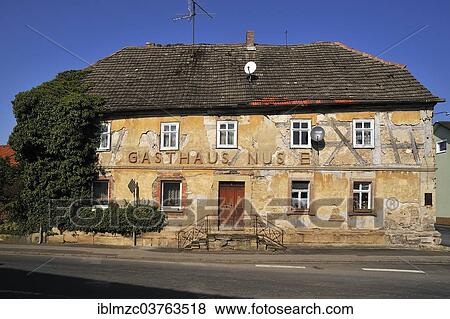 "Former guest house in need of repair, old half-timbered house, Donnersdorf, Lower Franconia, Bavaria, Germany, Europe" View Large Photo Image Stock Photo - "Former guest house in need of repair, old half-timbered house, Donnersdorf, Lower Franconia, Bavaria, Germany, Europe". Fotosearch