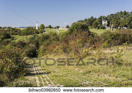 "Former inner German border, death zone with patrol path, observation towers, Point Alpha Memorial, Geisa, Rhon Mountains, Thuringia, Germany, Europe" View Large Photo Image Stock Image - "Former inner German border, death zone with patrol path, observation towers, Point Alpha Memorial, Geisa, Rhon Mountains, Thuringia, Germany, Europe". Fotosearch