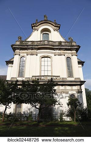 "Former Schoental Cistercian abbey, rear view of the Baroque monastery church, by architect Leonhard Dientzenhofer, Schoental in Jagsttal valley, Baden-Wuerttemberg, Germany, Europe" View Large Photo Image Stock Photograph - "Former Schoental Cistercian abbey, rear view of the Baroque monastery church, by architect Leonhard Dientzenhofer, Schoental in Jagsttal valley, Baden-Wuerttemberg, Germany, Europe". Fotosearch