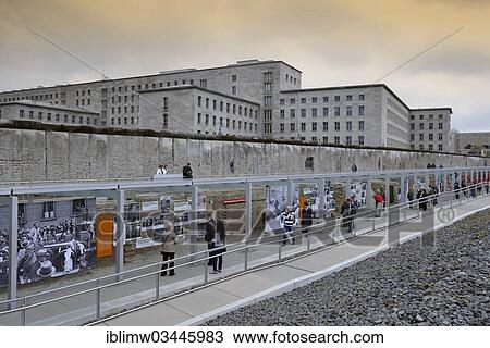 Stock Image - "Former site of the Gestapo, the SS and the Reich Main Security Office, """"Topography of Terror"""" exhibition, remnants of the wall with the Detlev Rohwedder Building at back, Berlin, Berlin, Germany, Europe". Fotosearch
