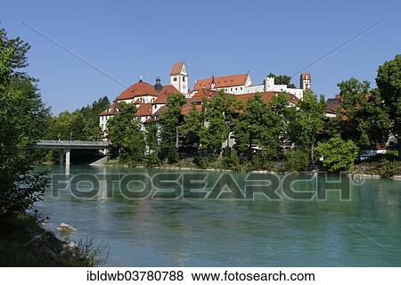 "Former St. Mang's Abbey with the Hohe Schloss Castle above the Lech River, Fussen, Ostallgau, Allgau, Swabia, Bavaria, Germany, Europe" View Large Photo Image Stock Photo - "Former St. Mang's Abbey with the Hohe Schloss Castle above the Lech River, Fussen, Ostallgau, Allgau, Swabia, Bavaria, Germany, Europe". Fotosearch