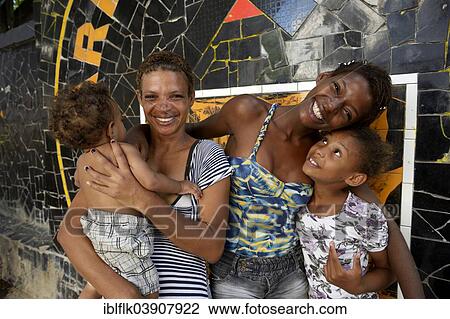 "Former street child, girl, 15, hugging her mother and siblings, Lapa district, Rio de Janeiro, Rio de Janeiro State, Brazil, South America" View Large Photo Image Stock Image - "Former street child, girl, 15, hugging her mother and siblings, Lapa district, Rio de Janeiro, Rio de Janeiro State, Brazil, South America". Fotosearch
