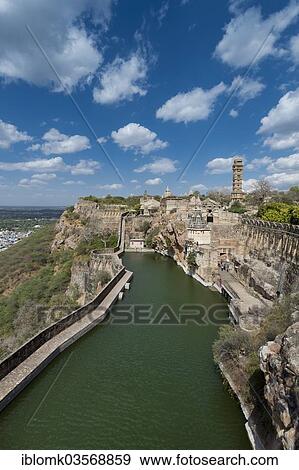 "Fortified wall, reservoir of Chittorgarh Fort of the Hindu Rajput princes with a temple complex and Vijaya Stambha, a victory tower built during the reign of Rana Kumbha, Chittorgarh, Rajasthan, India, Asia" View Large Photo Image Stock Photo - "Fortified wall, reservoir of Chittorgarh Fort of the Hindu Rajput princes with a temple complex and Vijaya Stambha, a victory tower built during the reign of Rana Kumbha, Chittorgarh, Rajasthan, India, Asia". Fotosearch
