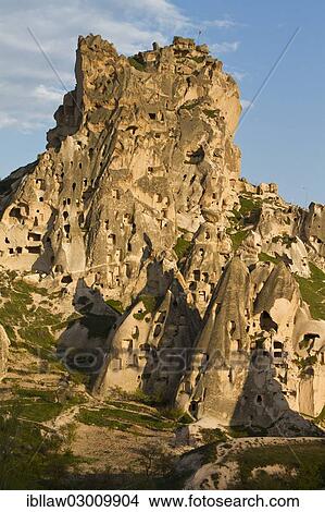 Picture - "Fortress of Uchisar surrounded by Fairy Chimneys made of tufa, Goreme National Park, Uchisar, Cappadocia, Nevsehir Province, Central Anatolia Region, Turkey, Asia". Fotosearch