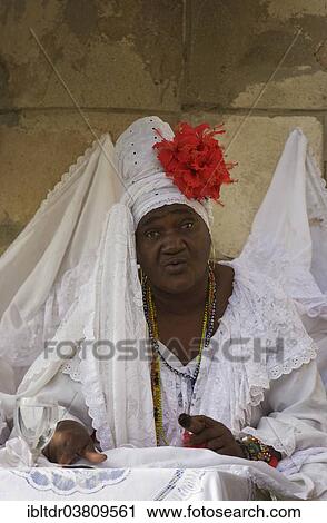 "Fortune teller wearing white clothes, Havana, Cuba, North America" View Large Photo Image Stock Image - "Fortune teller wearing white clothes, Havana, Cuba, North America". Fotosearch